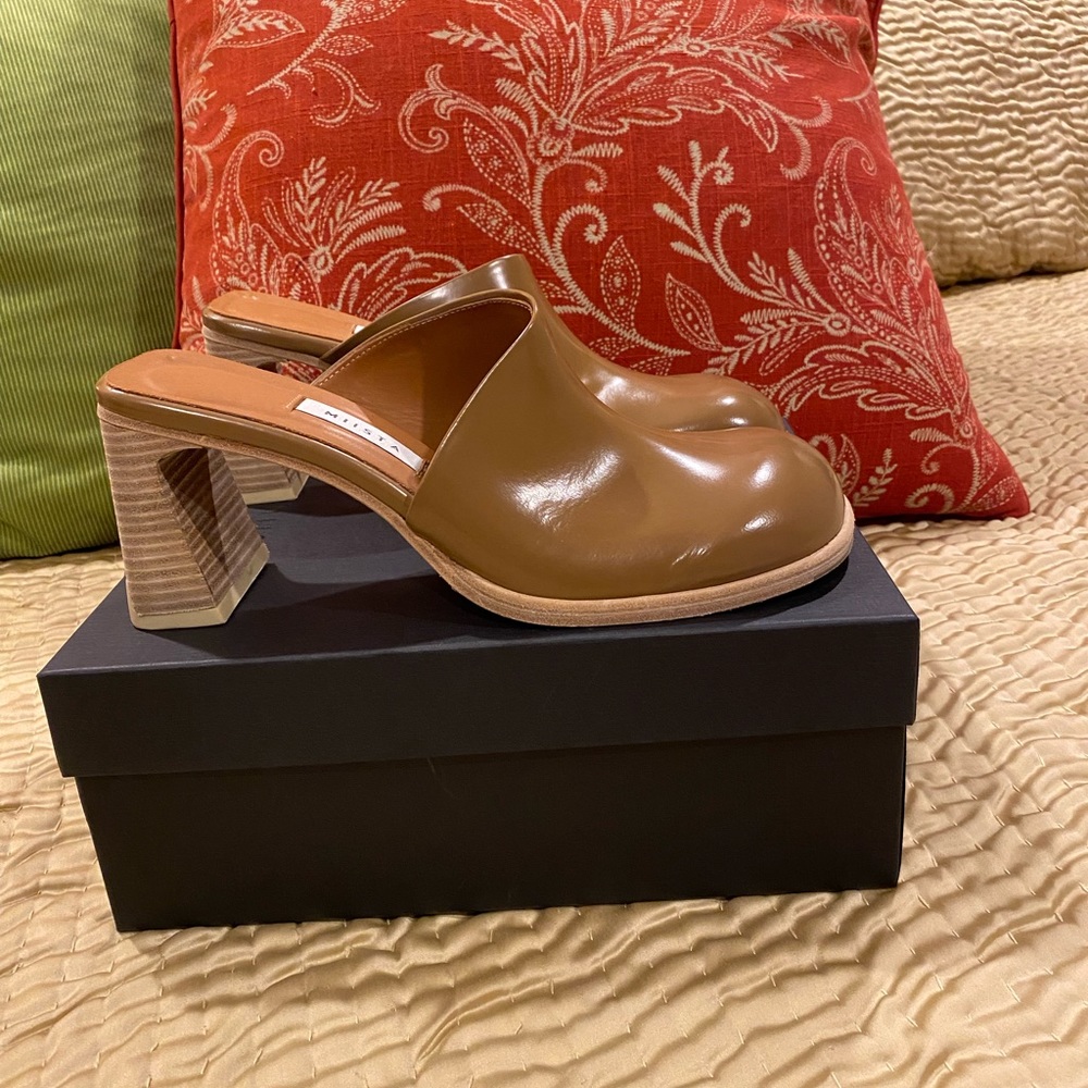 Brown/Beige closed toe designer Mules. Brand New, never been worn outside.